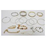 1224	18 ASSORTED LADIES BRACELETS INCLUDING 10 BANGLE AND 8 ASSORTED, MANY MARKED BY THE MAKER