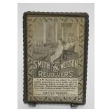 1082	ANTIQUE SMITH & WESSON REVOLVERS ADVERTISING POCKET MIRROR, APPROXIMATELY 3 IN X 5 IN