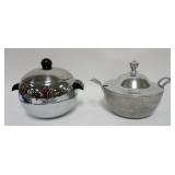 1124	WEST BEND COVERED PENGUIN AND WILTON ALUMINUM COVERED POT, LARGEST PIECE APPROXIMATELY 11 IN X 