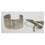 1163	2 BRACELETS, CUFF HAS TOUCH MARKS, KNOT BRACELET MARKED SIGIN TASCO MEXICO STERLING WEIGHING AP