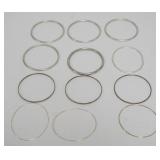 1172	12 LADIES BANGLE BRACELETS