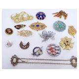 1173	APPROXIMATELY 17 LADIES DESIGNER PINS, SOME MARKED BY THE MAKER