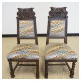 1251	PAIR OF CARVED OAK CHAIRS WITH UPHOLSTERED SEATS AND BACK CHAIR CREST CARVED WITH FALCON HEADS 