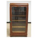 1257	NICE SAGINAW OAK BOOKCASE WITH CURVED SIDES AND APPLIED CARVINGS, APPROXIMATELY 32 IN X 15 IN X
