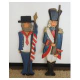 1264	PAIR OF WOOD FOLK ART CARVED AND PAINT DECORAED PATROITIC FIGURES, TALLEST APPROXIMATELY 50 IN 