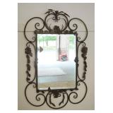 1265	BEVELED GLASS HANGING MIRROR IN FANCY WROUGHT IRON FRAME, APPROXIMATELY 31 IN X 47 IN