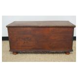1270	PRIMITIVE PIN DOVETAILED BLANKET CHEST ON BUN FEET WITH HAND FORGED STRAP HINGES, APPROXIMATELY