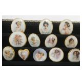 1049	NICE ASSORTMENT OF PORCELAIN PORTRAIT BUTTONS INCLUDING CHERUBS