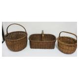 1101	GROUP OF 3 WOVEN SPLINT BASKETS, LARGEST APPROXIMATELY 17 1/2 IN X 12 IN X 10 1/4 IN