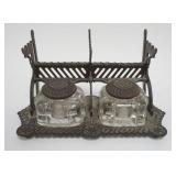 1105	ANTIQUE DOUBLE INKWELL IN ORNATE CAST METAL STAND W/PEN HOLDERS, APPROXIMATELY 10 IN X 5 IN X 6