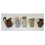 1123	GROUP OF ASSORTED PITCHERS INCLUDING MAJOLICA, ARTHUR WOOD HORSE HEAD HANDLED PITCHER, REDWARE,