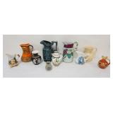 1125	GROUP OF ASSORTED PITCHERS INCLUDING MYOTT & SONS, RODDYWARE, J&G MEAKIN, HORSEMAN & CAPODIMONT