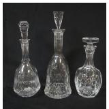 1158	3 CRYSTAL DECANTORS, LARGEST APPROXIMATELY 15 IN HIGH