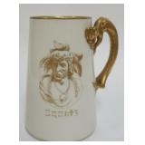 1022	WILLETS BELLEEK MUG WITH IMAGE OF AMERICAN INDIAN AND DRAGON HANDLE, APPROXIMATELY 6 IN H