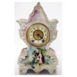 1052	AMERICAN BELLEEK CERAMIC ART COMPANY CLOCK, WATERBURY CLOCK WORKS, APPROXIMATELY 7 IN X 4 IN X 