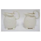 1204	2 LENOX GREEN MARK DIMPLED PITCHERS W/WOMANS FACE ON LIP, EACH APPROXIMATELY 8 IN HIGH