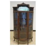 1241	SOLID OAK CURVED GLASS CHINA CABINET WITH CARVED MIRROR BACK GALLERY TOP, NORTH FACE, MIRROR NE