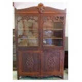 1246	VICTORIAN OAK 4 DOOR CABINET WITH CARVED MEDALLION ON CREST, 3 ADJUSTABLE SHELVES, 1 DRAWER IN 