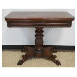 1249	EMPIRE MAHOGANY CARVED PAW FOOT GAME TABLE, APPROXIMATELY 36 IN X 18 IN X 30 IN H CLOSED, OPEN 