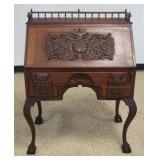 1250	ANTQUE HEAVILY CARVED MAHOGANY DESK WITH TURNED SPINDLE GALLERY TOP, 3 DRAWER WITH BALL & CLAW 