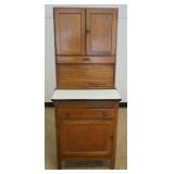 1276	MONARCH NARROW KITCHEN CABINET WITH TAMBOR SLIDE AND ENAMELED TOP, APPROXIMATELY 28 IN X 25 IN 
