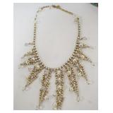 1153	GOLD COLORED AND RHINESTONE NECKLACE
