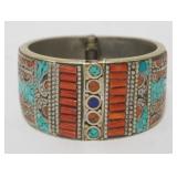 1155	OUTSTANDING MULTI COLORED TURQUOISE HEAVY BAND BRACELET, APPROXIMATELY 3 1/4 IN WIDE X 2 3/8 IN