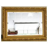 1191	LABARGE ORNATE GILT DEEP WELL FRAMED BEVELED EDGE MIRROR, APPROXIMATELY 45 IN X 33 IN