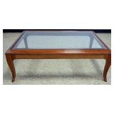 1235	LANE SOLID CHERRY INSET BEVELED EDGE GLASS TOP COCKTAIL TABLE, APPROXIMATELY 48 IN X 34 IN X 17