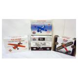1104	4 DIE CAST AIRPLANE COIN BANKS IN ORGINAL BOXES