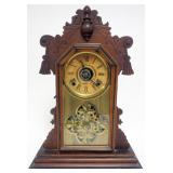 1135	INGRAHAM SHELF CLOCK WITH NICE GILT REVERSE DECORATED GLASS DOOR, APPROXIMATELY 15 IN X 16 IN X