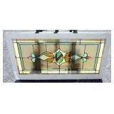 1140	STAIN GLASS WINDOW, APPROXIMATELY 20 IN X 36 IN