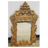 1178	GILT COMPOSITE FRAMED MIRROR, APPROXIMATELY 25 IN X 42 IN