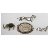 1205	4 STERLING SILVER PINS, 2 DACHSHUND, ELEPHANT WITH ONYX AND QUARTZ PIN HAS CHIP IN STONE, TOTAL