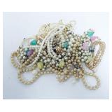 1208	10 PEARL NECKLACES AND 2 PEARL BRACELETS AS FOUND