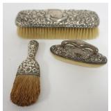 1238	2 STERLING SILVER BRUSHES AND NAIL BUFFER