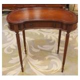 1274	PETITE MAHOGANY KIDNEY SHAPED LEATHER TOP WRITING TABLE WITH TAPERED REEDED LEGS, APPROXIMATELY