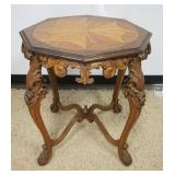 1290B	ORNATE WALNUT LAMP TABLE W/HIGHLY CARVED LEGS & SKIRT, BURL & SATIN WOOD INLAID, APPROXIMATELY