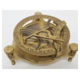 1014	BRASS ENGLISH NAUTICAL COMPASS, APPROXIMATELY 5 IN X 2 IN HIGH
