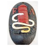 1050	CAST IRON FIRE MARKER, APPROXIMATELY 10 1/2 IN X 7 IN