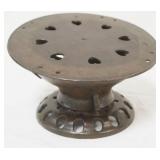 1056	CAST IRON FOOTWARMER W/HEART SHAPE CUT OUTS ON TOP, APPROXIMATELY 10 IN ROUND X 5 1/2 IN HIGH