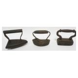 1079	3 ANTIQUE FLAT IRONS, ONE MARKED KEYSTONE W/A KEYSTONE EMBOSSED IN CENTER, W CROSS ROUND BOTTOM