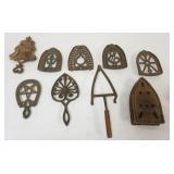 1100	GROUP OF ASSORTED ANTIQUE TRIVETS INCLUDING CAST IRON ENTERPRIZE, LARGEST APPROXIMATELY 12 IN X