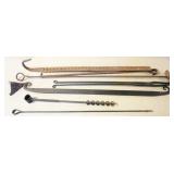 1109	GROUP OF ASSORTED ANTIQUE IRON ITEMS INCLUDING FIREPLACE TONGS, FIREPLACE TRAMMEL, AUGER, GIMLE