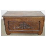 1168	OAK STORAGE CHEST WITH PANELED SIDES AND APPLIED CARVING, APPROXIMATELY 44 IN X 21 IN X 24 IN H