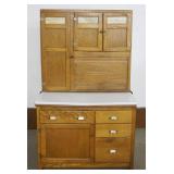 1185	WILSON OAK KITCHEN CABINET WITH BROWN SLAG GLASS PANELS AT TOP, APPROXIMATELY 42 IN X 25 IN X 6