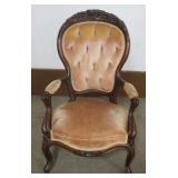 1213	WALNUT VICTORIAN CARVED PARLOR ARM CHAIR WITH TUFTED UPHOLSTERED BACK, APPROXIMATELY 26 IN X 25