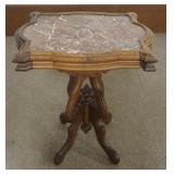1214	WALNUT VICTORIAN MARBLE TOP PARLOR TABLE WITH BROWN INSET MARBLE TOP, APPROXIMATELY 26 IN X 19 