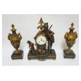 1004	FRENCH CLOCK SET, 3 PIECE, MARBLE & METAL CLOCK SET W/FIGURAL PUTTI & WINGED LADY, 2 MARBLE BASED URNS, SOME LOSS TO METAL ORNAMENT, CLOCK APPROXIMATELY 12 IN X 5 IN X 18 IN HIGH