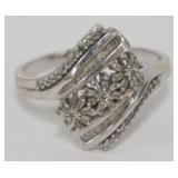 1137	10 K WHITE GOLD AND DIAMOND RING, WOMENS SIZE 12, UNSURE OF TOTAL DIAMOND WT